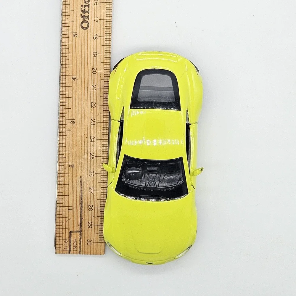 RMZ City Aston Martin Vantage Yellow Diecast Model Car 5 inch Pullback